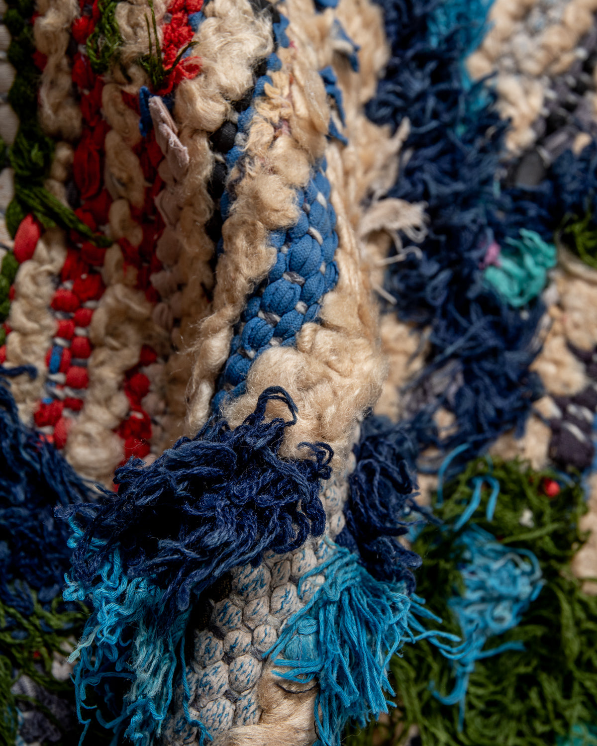 Modern designer vintage handcrafted Berber rug from Morocco. Boucherouite runner rug with beautiful colors and patterns.