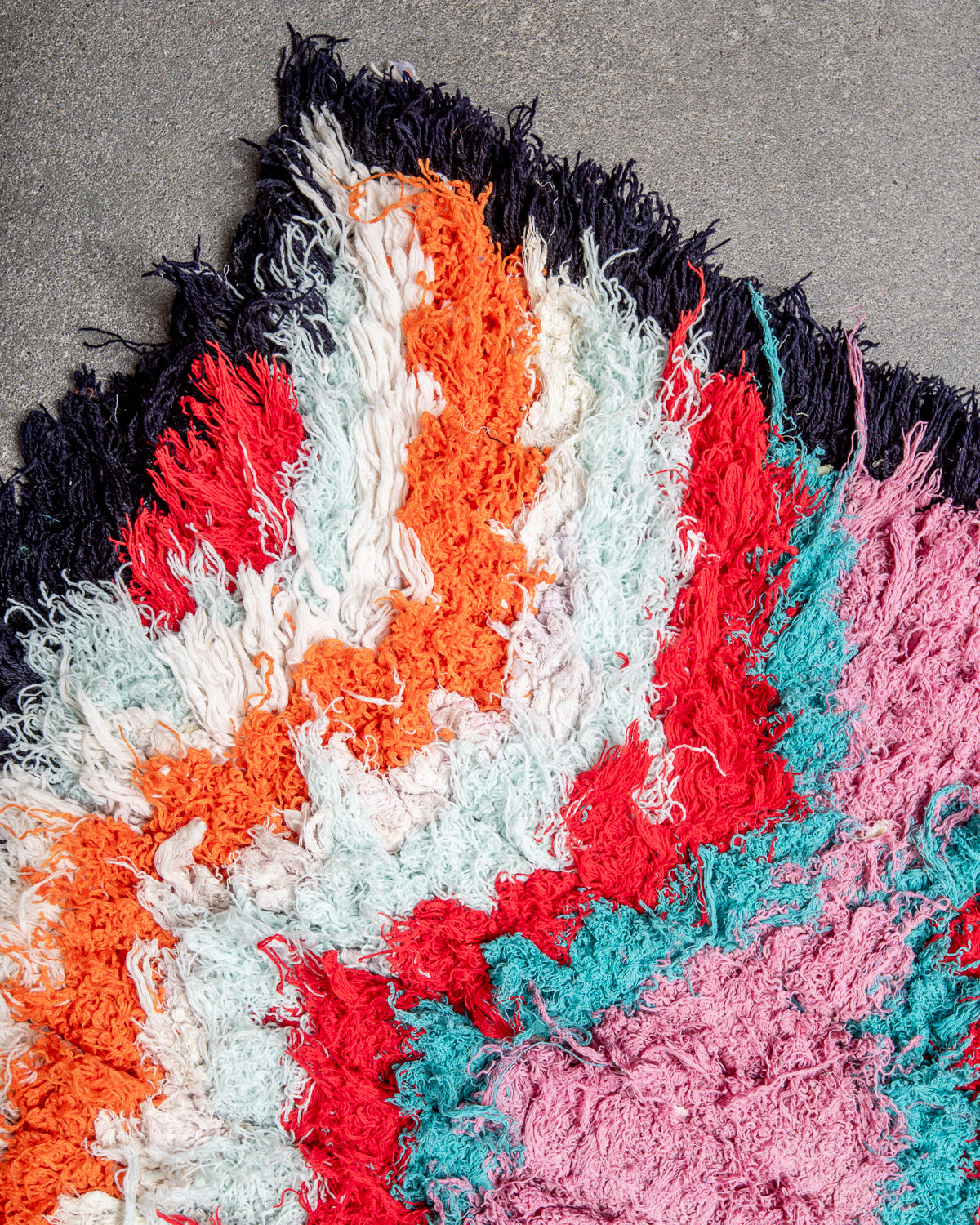 Modern designer vintage handcrafted Berber rug from Morocco. Boucherouite runner rug with beautiful colors and patterns.