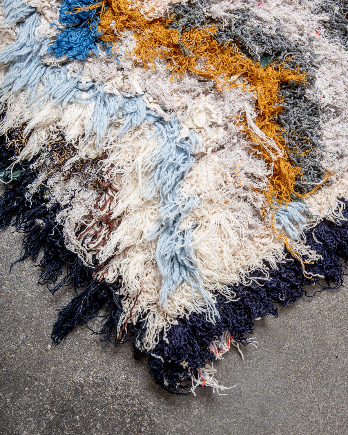 Modern designer vintage handcrafted Berber rug from Morocco. Boucherouite runner rug with beautiful colors and patterns.