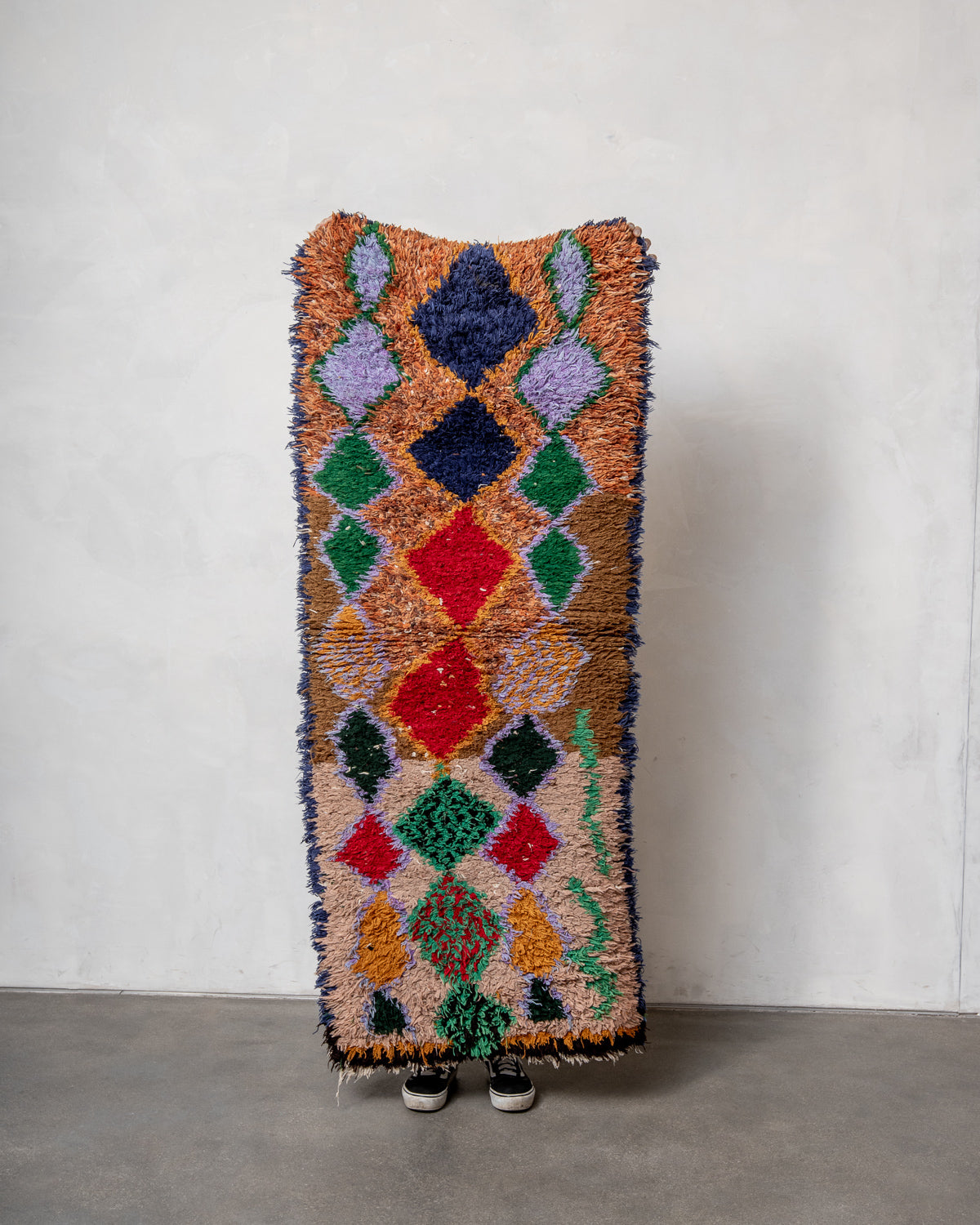 Modern designer vintage handcrafted Berber rug from Morocco. Boucherouite runner rug with beautiful colors and patterns.