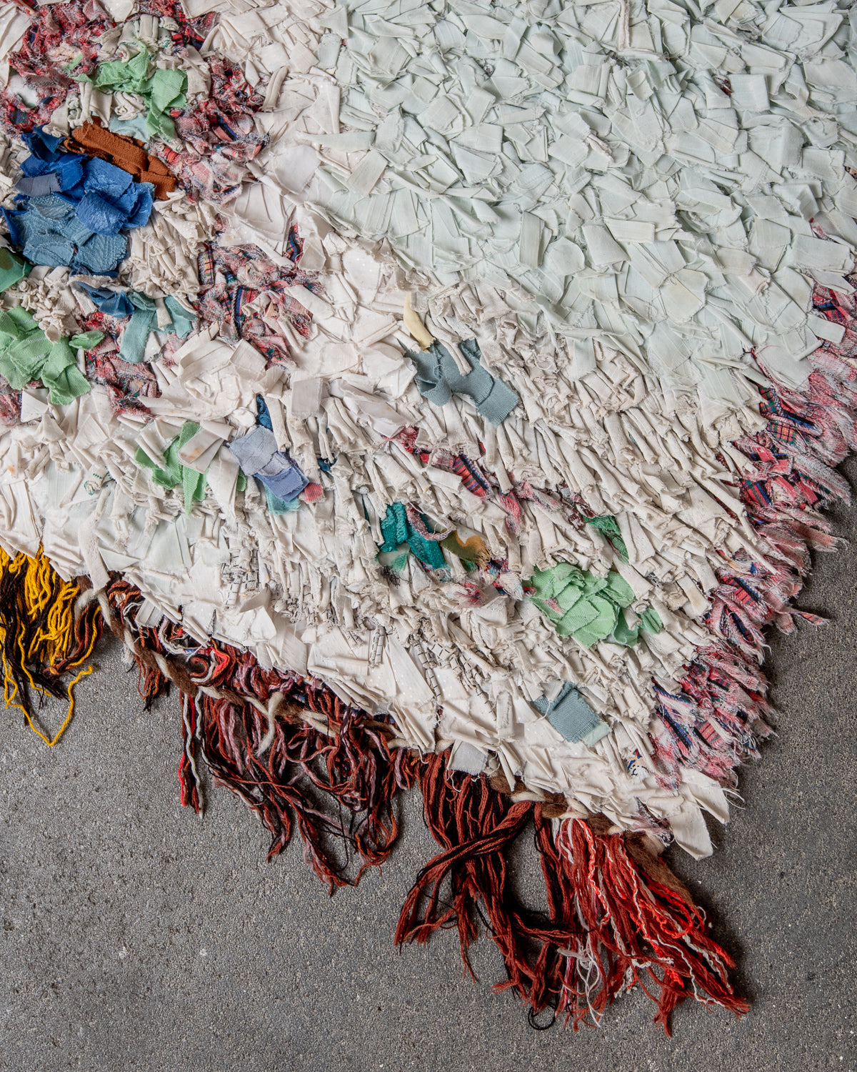 Modern designer vintage handcrafted Berber rug from Morocco. Boucherouite with beautiful colors and patterns.