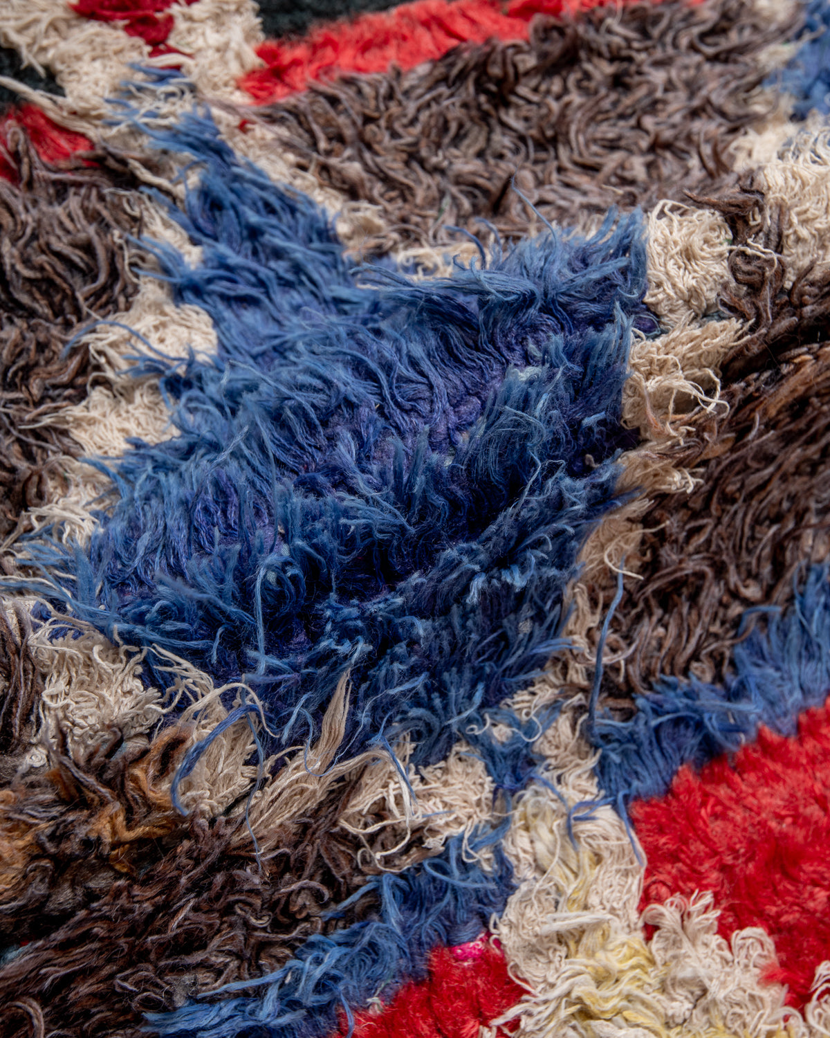 Modern designer vintage handcrafted Berber rug from Morocco. Boucherouite with beautiful colors and patterns.