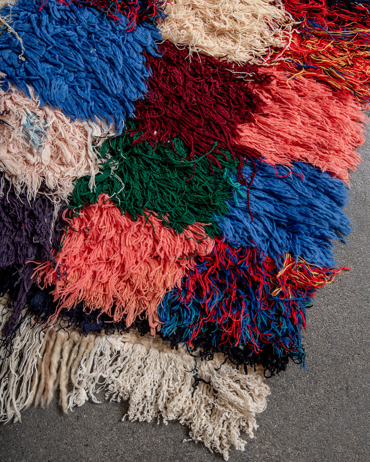 Modern designer vintage handcrafted Berber rug from Morocco. Boucherouite with beautiful colors and patterns.