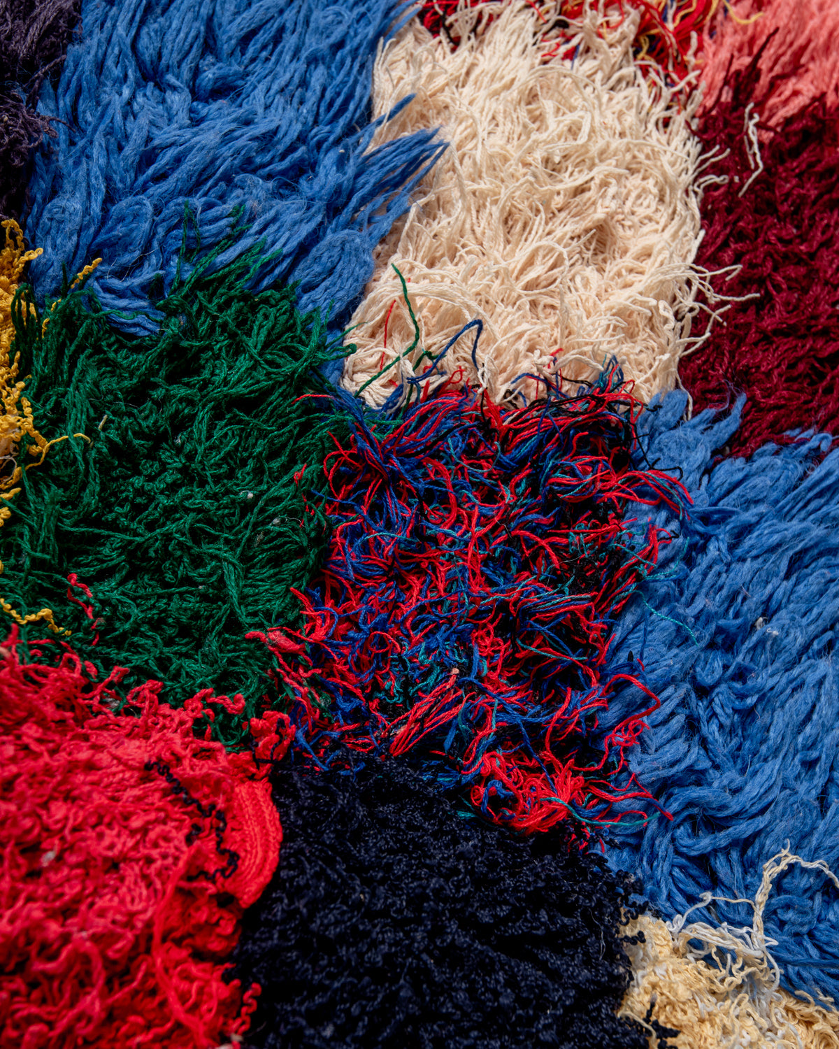 Modern designer vintage handcrafted Berber rug from Morocco. Boucherouite with beautiful colors and patterns.