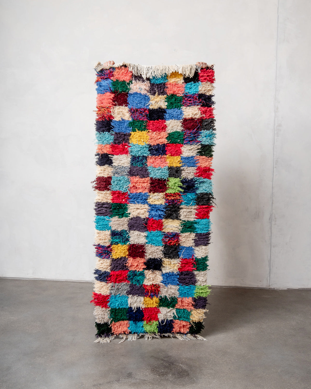 Modern designer vintage handcrafted Berber rug from Morocco. Boucherouite with beautiful colors and patterns.