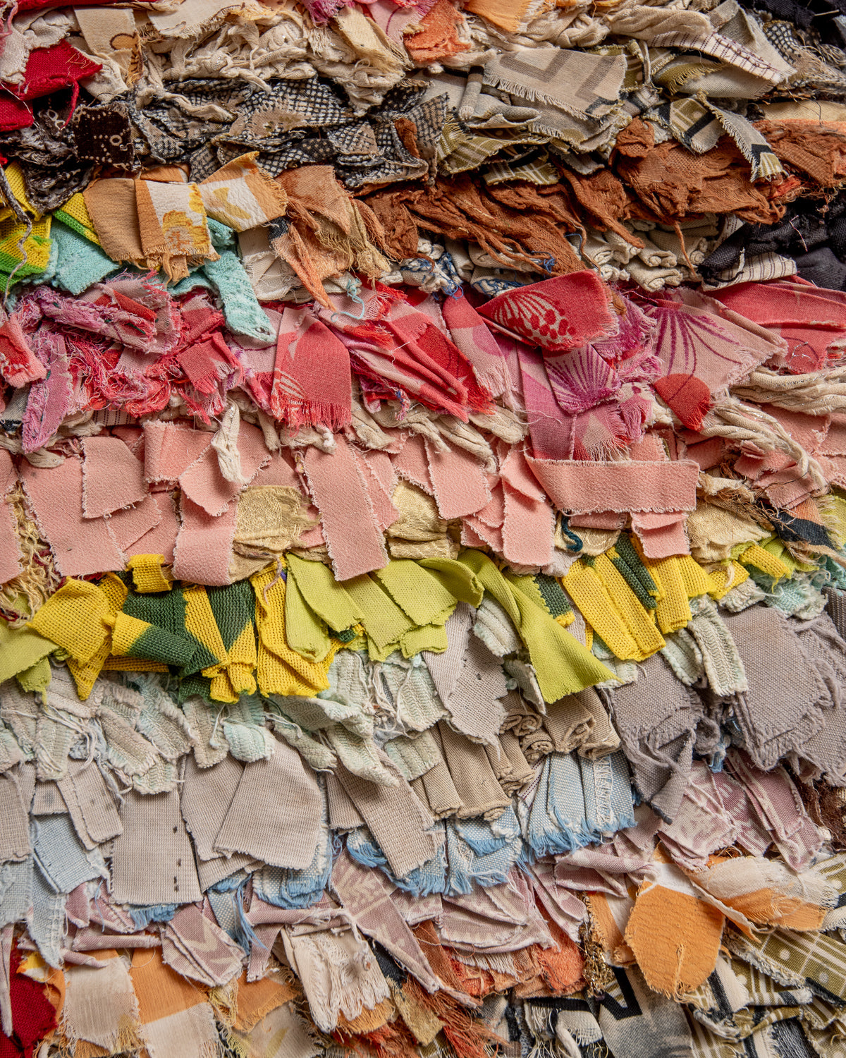 Modern designer vintage handcrafted Berber rug from Morocco. Boucherouite runner rug with beautiful colors and patterns.