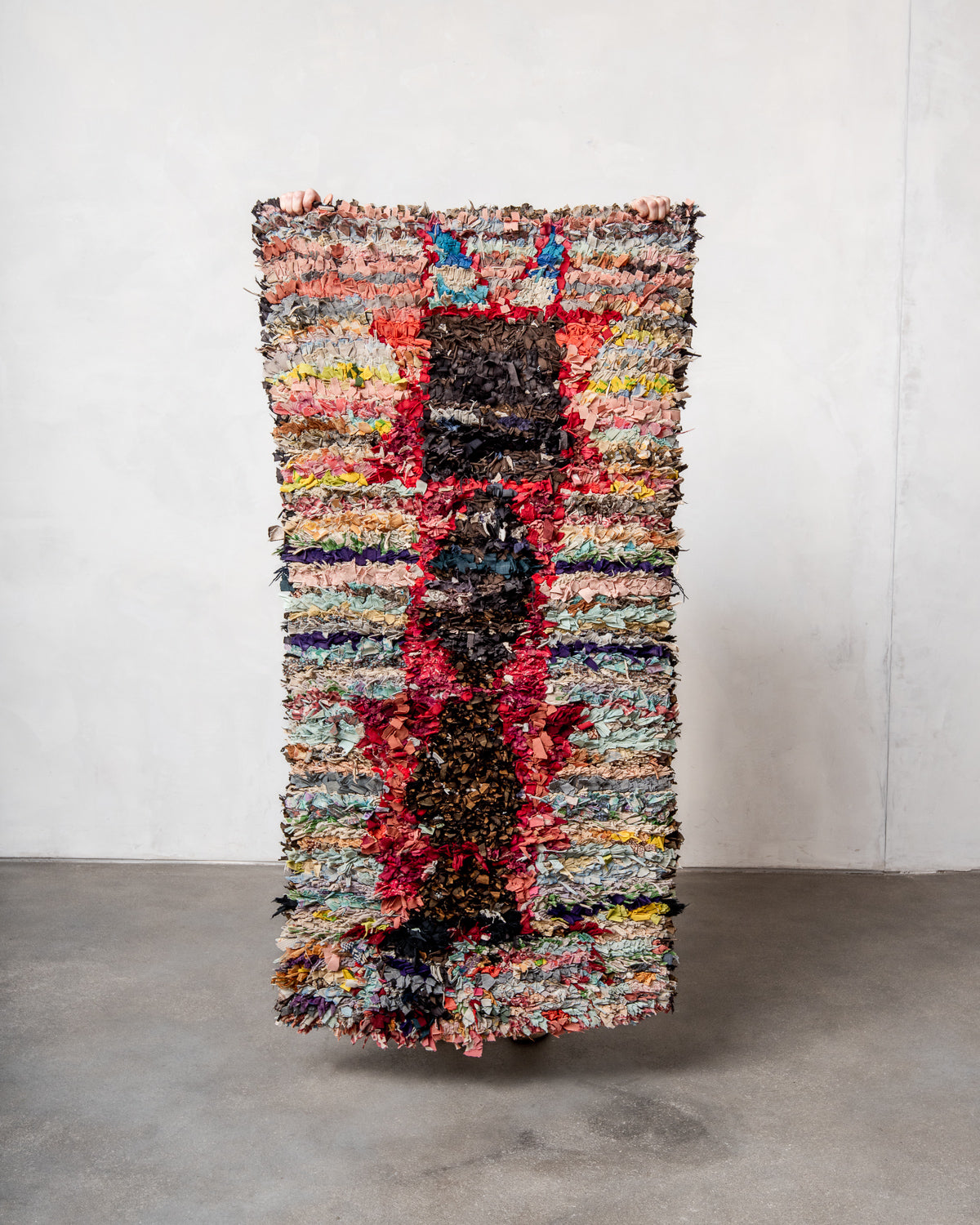 Modern designer vintage handcrafted Berber rug from Morocco. Boucherouite runner rug with beautiful colors and patterns.