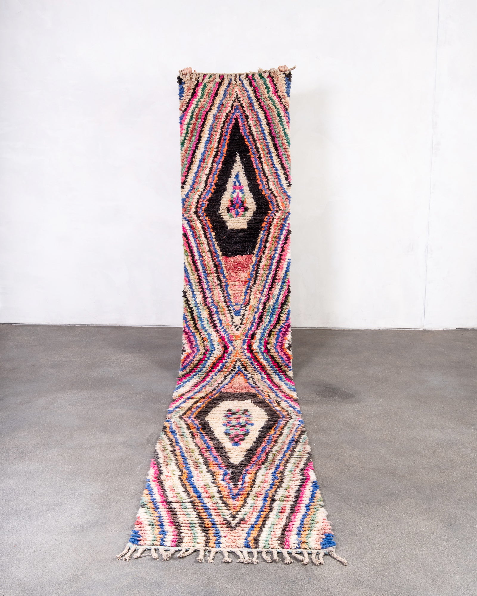 Modern designer handcrafted Berber rug from Morocco. Boujed with beautiful colors and patterns.