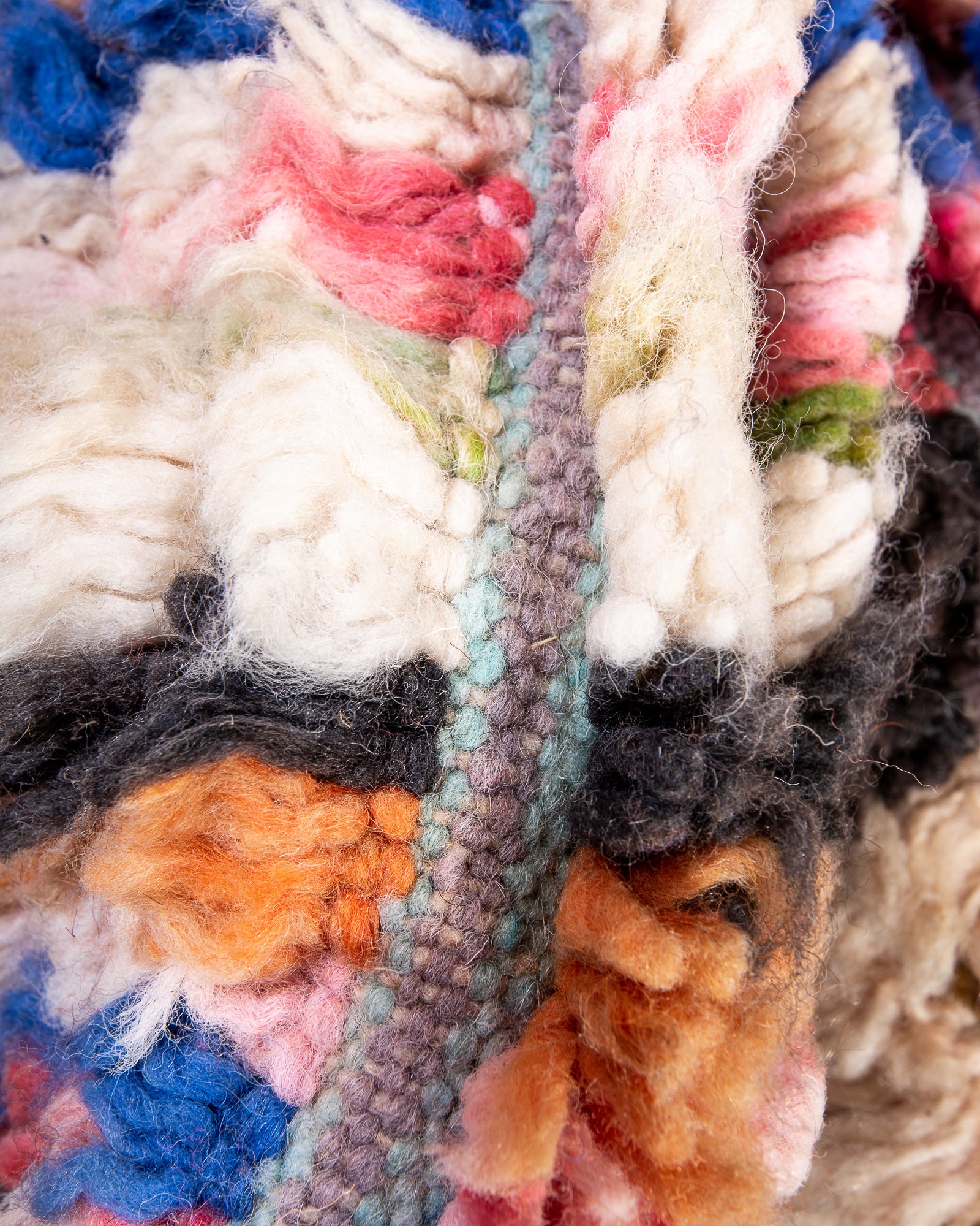 Modern designer handcrafted Berber rug from Morocco. Boujed with beautiful colors and patterns.