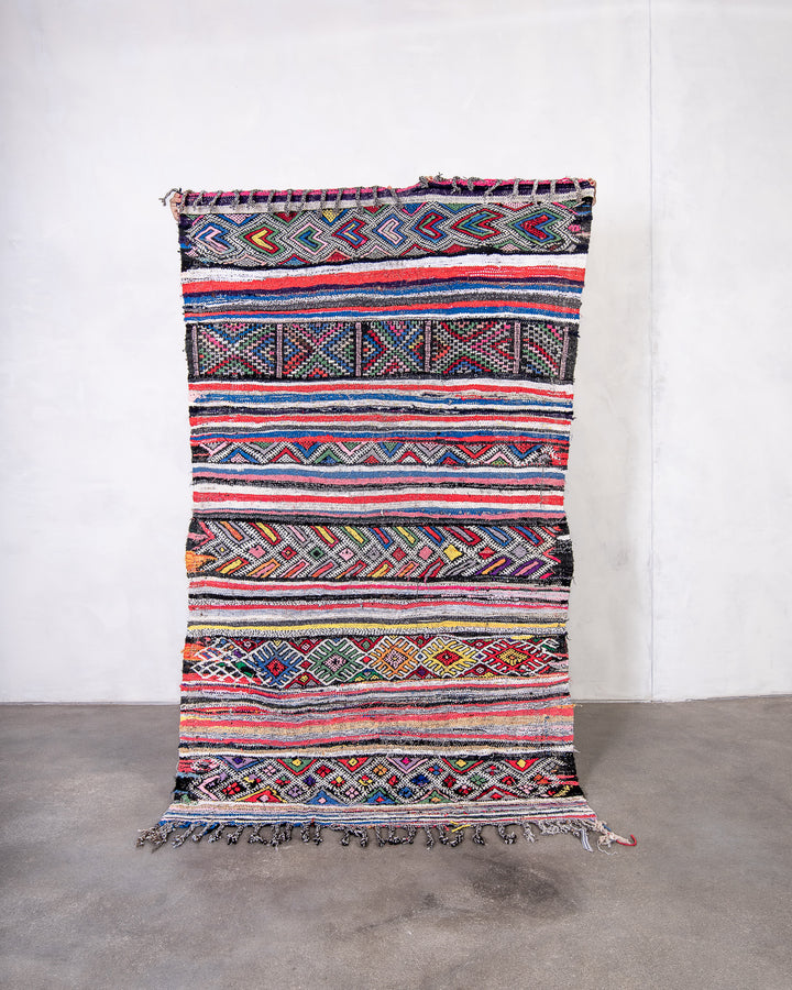 Modern, designer, handcrafted Berber rug from Morocco. Kelim carpet with beautiful colours and patterns and fluffy wool texture.