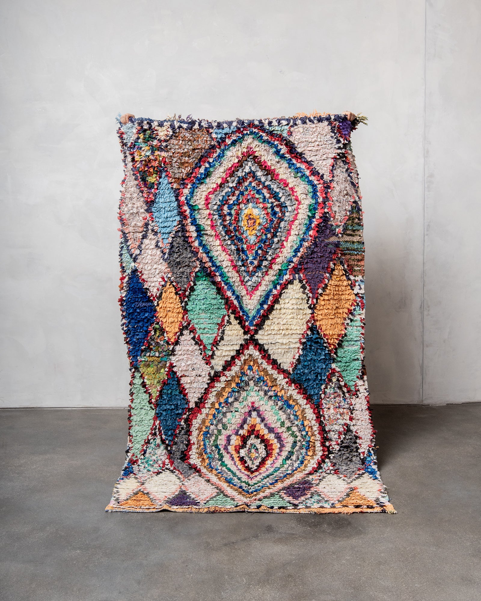 Modern designer vintage handcrafted cotton Berber rug from Morocco. Boucherouite with beautiful colors and patterns.