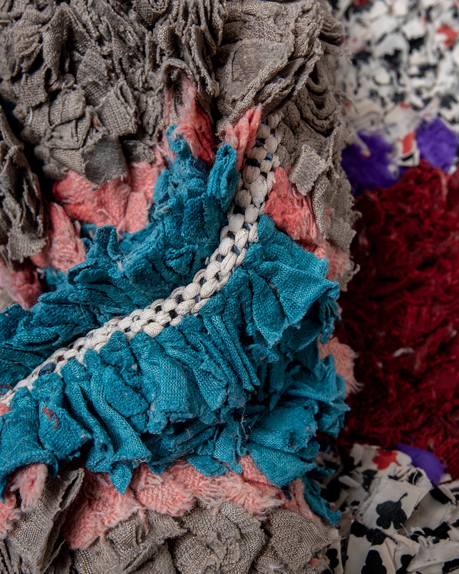 Modern designer vintage handcrafted cotton Berber rug from Morocco. Boucherouite with beautiful colors and patterns.