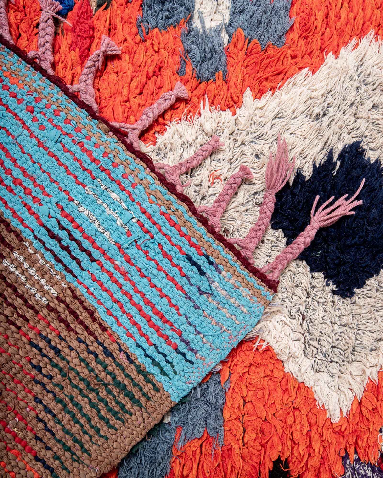 Modern, designer, handcrafted Berber rug from Morocco. Boucherouite carpet with beautiful colours and patterns and fluffy wool texture.